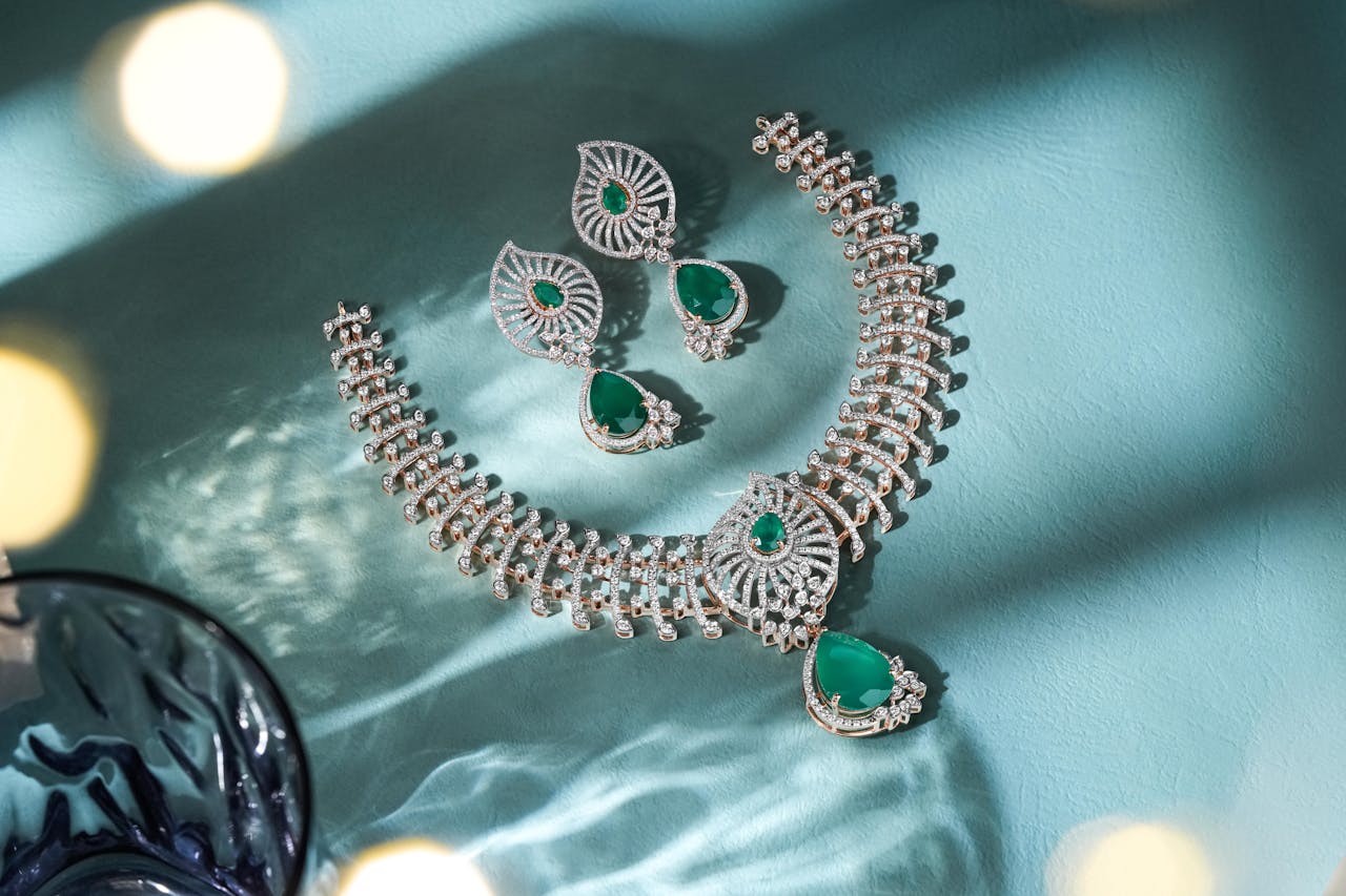 home-img Dazzling diamond and emerald jewelry set beautifully showcased, perfect for festive occasions.